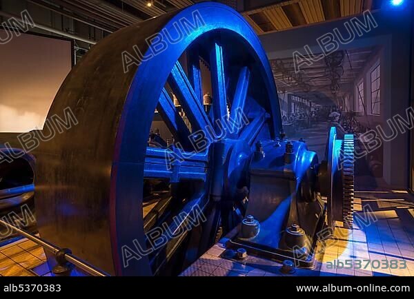 Drive wheel of a two-cylinder tandem steam engine, MAN, built 1907, Museum Industrial Culture, Nuremberg, Middle Franconia, Bavaria, Germany, Europe.