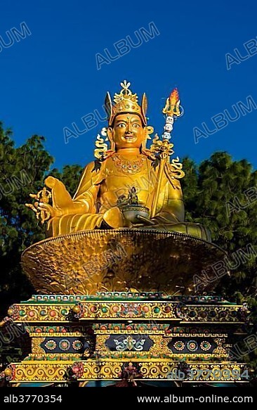 Big golden statue of Padmasambhava at back of Swayambhunath temple, Kathmandu, Nepal, Asia.