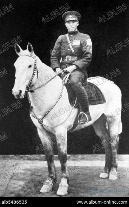 Ma Zhongying on horseback, wearing KMT 36th Division uniform 