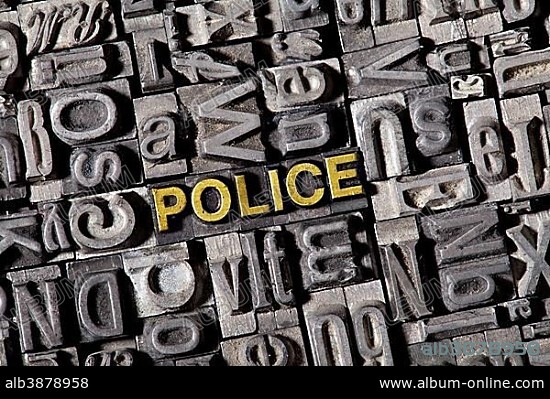 The word "Police", made of old lead type.