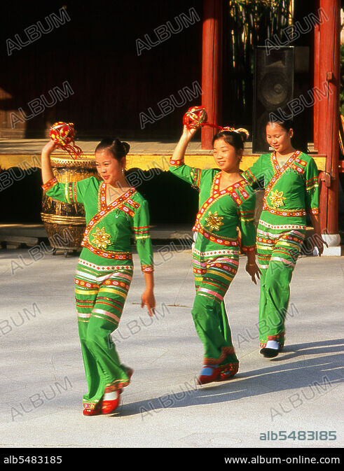 Young Zhuang women dancing at the Guangxi Provincial Museum, Nanning ...