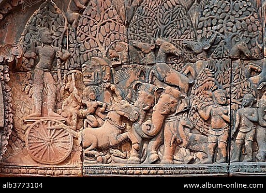 Indra, god of the sky, releasing rain in an attempt to extinguish the fire created by Agni, scene depicting Krishna and his brother Balarama surrounded by animals in a forest, part of the bas-reliefs of the east-facing pediment of the Northern Library, Banteay Srei temple, Citadel of the Women, Angkor, Cambodia, Southeast Asia, Asia.