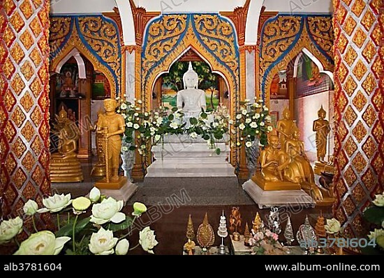 Buddha in the temple Wat Chalong, the largest and most prominent of the 29 Buddhist temples of Phuket island, Thailand, Asia.