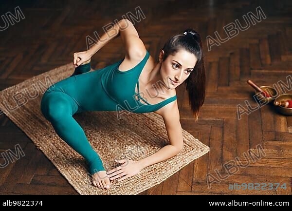 Young Slim Attractive Brunette In Lizard Yoga Position Yoga Studio Interior  Stock Photo - Download Image Now - iStock