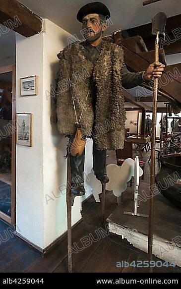 Figure of a french shepherd on stilts, which were used for walking in wetlands and for getting an overview, Deutsches Hirtenmuseum or German Shepherds Museum, Hersbruck, Middle Franconia, Bavaria, Germany, Europe.