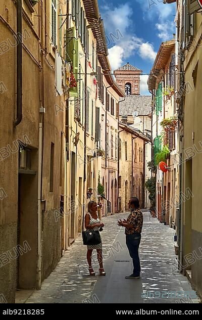 Foligno Umbria Italy. Talking in the alleys of the old town.