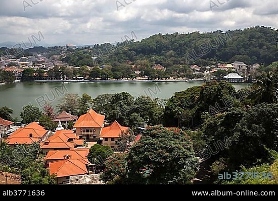 View of Kandy Lake and Kandy, Sri Dalada Maligawa or Temple of the Sacred Tooth Relic back right, Buddhist sanctuary, Kandy, Central Province, Sri Lanka, Asia.