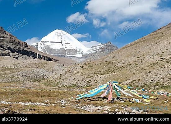 Tibetan Buddhism, colorful prayer flags, snow-covered holy Mount Kailash, Gang Rinpoche mountain, south face with cleft, pilgrims' path near Selung Gompa monastery, Kora pilgrimage, Ngari Prefecture, Gangdise Mountains, Trans-Himalaya mountain range, Himalayas, west Tibet, Tibet Autonomous Region, People's Republic of China, Asia.