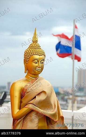 Theravada Buddhism, golden Buddha statue, Thailand's national flag, Golden Mountain, Wat Saket Monastery, Bangkok, Thailand, Southeast Asia, Asia.