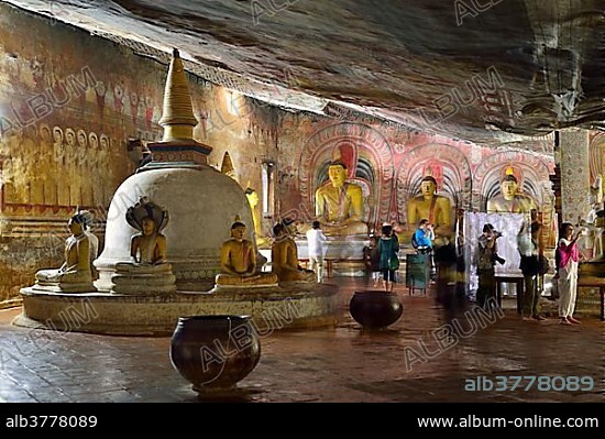 Stupa, Buddha statues and murals in one of the cave temples of the Golden Temple, UNESCO World Heritage Site, Dambulla, Central Province, Sri Lanka, Asia.