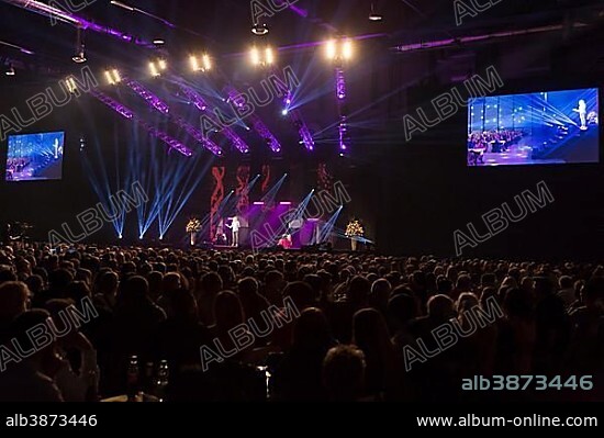 Swiss actress, TV presenter, singer and comedienne Stephanie Berger live, auditorium with illuminated stage, Lucerne, Switzerland, Europe.