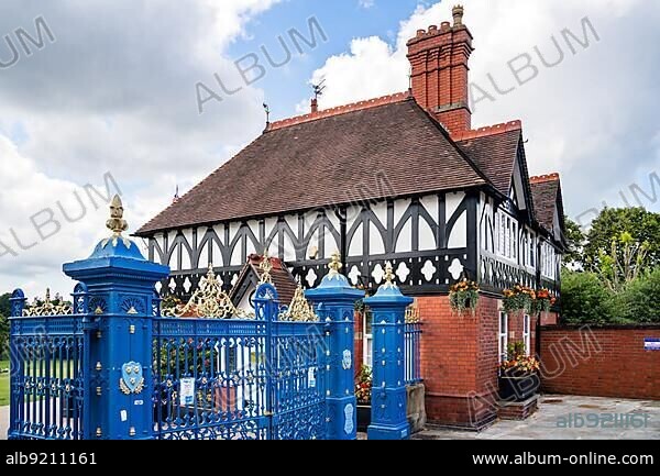 SHREWSBURY, SHROPSHIRE, UK - JULY 13 : Blue gates that mark the entrance to Quarry Park, Shrewsbury, Shropshire on July 13, 2021.