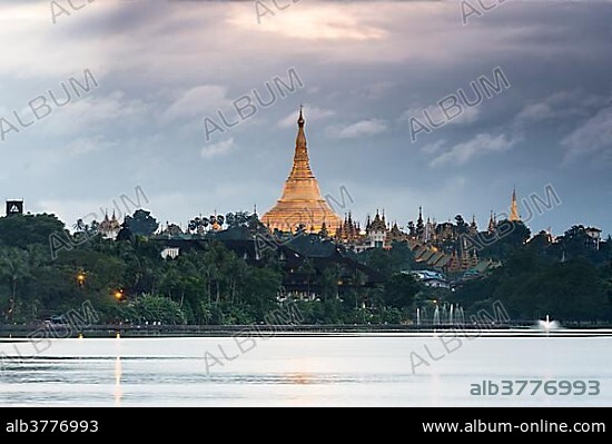 Golden main stupa at dusk, chedi, Shwedagon Pagoda, Kandawgyi Lake, Kandawgyi Nature Park, Yangon or Rangoon, Yangon Region, Myanmar, Asia.