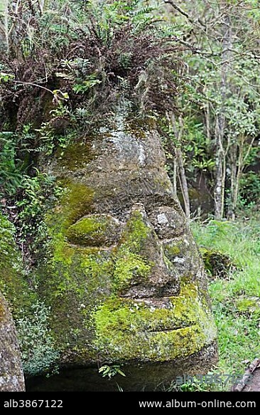 Sculpture of a face, hewn tuff rock, Isla Santa Maria or Floreana Island, Galapagos Islands, Ecuador, South America.