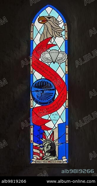 Stained glass window dedicated to Robert Wright and Ken Moore; WW2 US Army medics in the church at Angoville-au-Plain; Manche; Normandy; France; Europe.