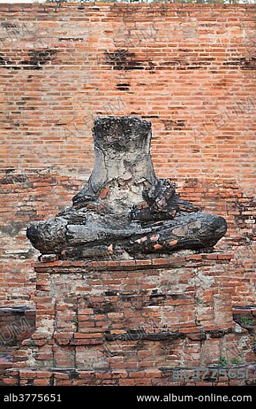 Decapitated Buddha statue at Wat Ratchaburana, Ayutthaya, Thailand, Asia.