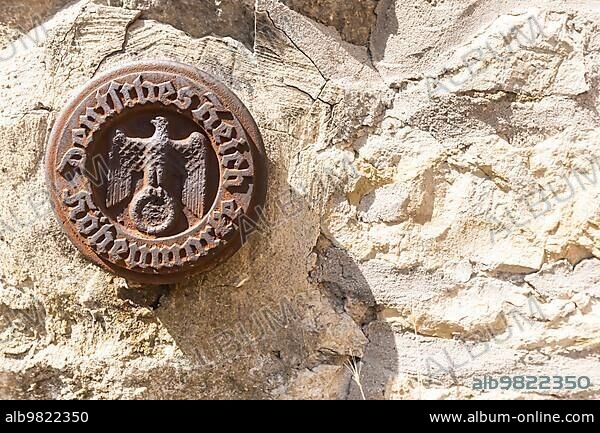 High German Reich stamp with Reich eagle and ground-off swastika; Ritterstiftskirche St. Peter; Bad Wimpfen; Baden-Württemberg; Germany; Europe.