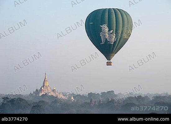 Hot air balloon over the landscape, Ananda Temple, temple complex with ...