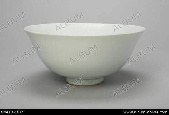 A KASHAN PIERCED WHITE-GLAZED CONICAL BOWL