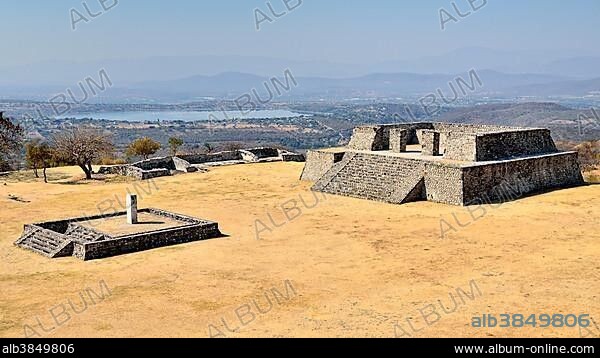 View of Plaza de la Estela from Gran Piramide, Laguna de Coatetelco behind, Ruins of Xochicalco, Cuernavaca, Morelos, Mexico, Central America.