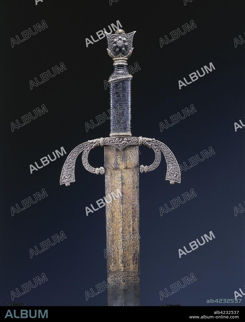 Parade Sword, c. 1500-1525. Italy, Ferrara, early 16th Century. Steel, etched and gilded; overall: 101.9 cm (40 1/8 in.); blade: 85.4 cm (33 5/8 in.); quillions: 17.5 cm (6 7/8 in.); grip: 11.1 cm (4 3/8 in.).