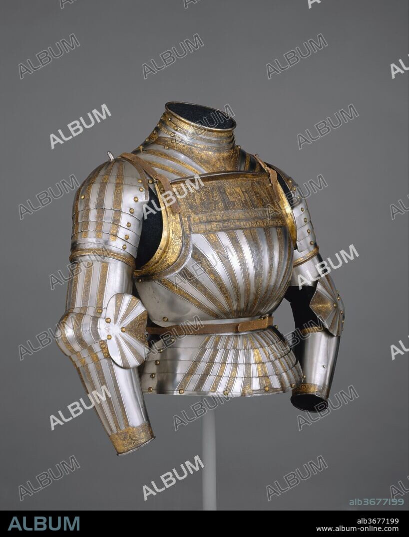 Elements of a Light-Cavalry Armor. Culture: Italian, Milan. Dimensions: Wt. 19 lb. 13 oz. (8987 g). Date: ca. 1510.
This is a rare example of Italian armor decorated with fluted surfaces in the German fashion. Its etched and richly gilt decoration is derived from Christian symbolism and the Bible. The band across the top of the breastplate depicts the Virgin and Child in the center, Saint Paul on the right, and Saint George on the left. A Latin inscription below reads, CHRISTVS RES VENIT IN PACE ET DEVS HOMO FACTVS ES (Christ the King came in peace and God was made man). Another inscription, across the top of the backplate, reads, IESVS AVTEM TRANSIENS PERMEDIVM ILORVM IBAT. (But Jesus passing through their midst went his way [Luke 4:30]). The Trinity--Father, Son, and Holy Spirit--is depicted on the front of the gorget (collar).