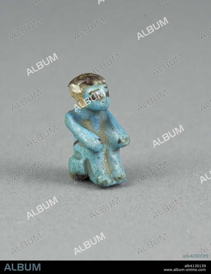 ANCIENT EGYPTIAN. Figurine of a Seated Man. Egyptian. Date: 2055 BC-1650 BC. Dimensions: 2.5 × 1.3 × 1.3 cm (1 × 1/2 × 1/2 in.). Faience. Origin: Egypt.