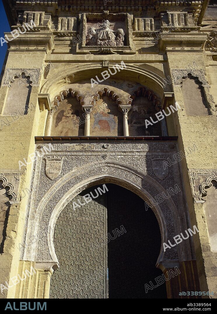Cordoba, Andalusia, Spain. Great Mosque of Cordoba. Abd al-Rahman I ordered its construction in 784, with subsequent extensions. North facade, along calle Cardenal Herrero. Door of Pardon or Door of Forgiveness, built in the 10th century and modified in 1377 in Mudejar style.