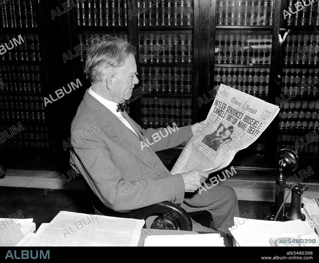 April 28, 1939 - Senator William Borah reads newspaper headlines on Adolf Hitler .