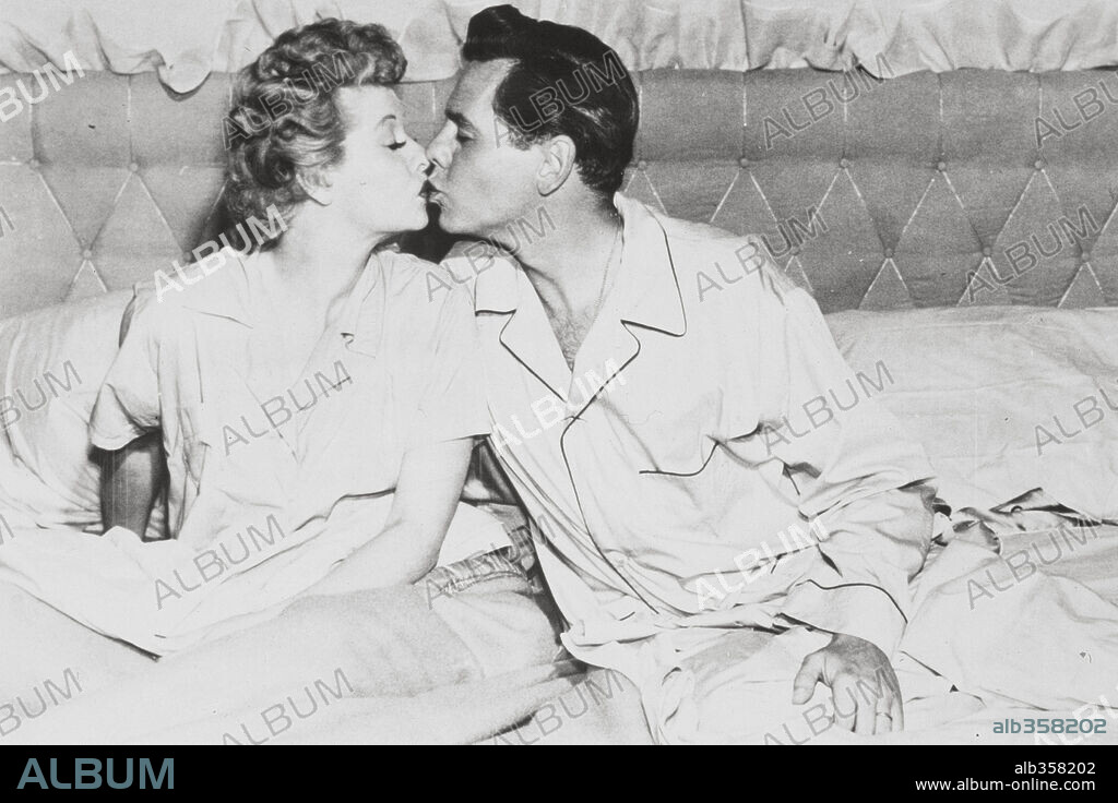 DESI ARNAZ and LUCILLE BALL in I LOVE LUCY, 1951. Copyright CBS-TV.