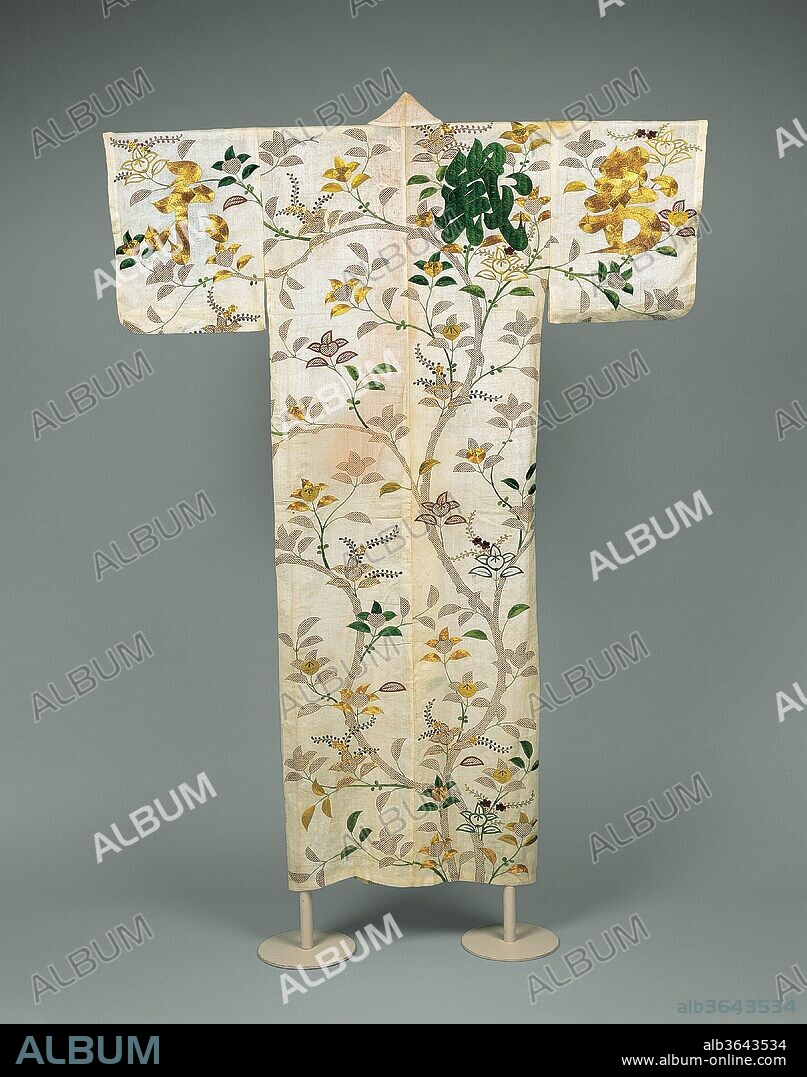 Robe (Kosode) with Mandarin Orange Tree and Auspicious Characters. Culture: Japan. Dimensions: 50 x 65 in. (127 x 165.1 cm). Date: second half of the 18th century.
An auspicious mandarin orange tree (tachibana) bearing fruit and flowers rises from the back hem of this narrow-sleeved robe (kosode). The sleeves and upper body of the robe are embellished with characters richly embroidered in green and purple silk and couched gold thread (laid across the ground fabric and stitched to the surface). The three characters (left to right) read manzai-raku, or "enjoying comfort for ten thousand years," which also alludes to a type of ancient court music (gagaku) and dance presented exclusively at the court to celebrate the New Year. At the same time, the phrase calls to mind a song from the auspicious Noh play Takasago, which proclaims that performing Manzai-raku brings long life.