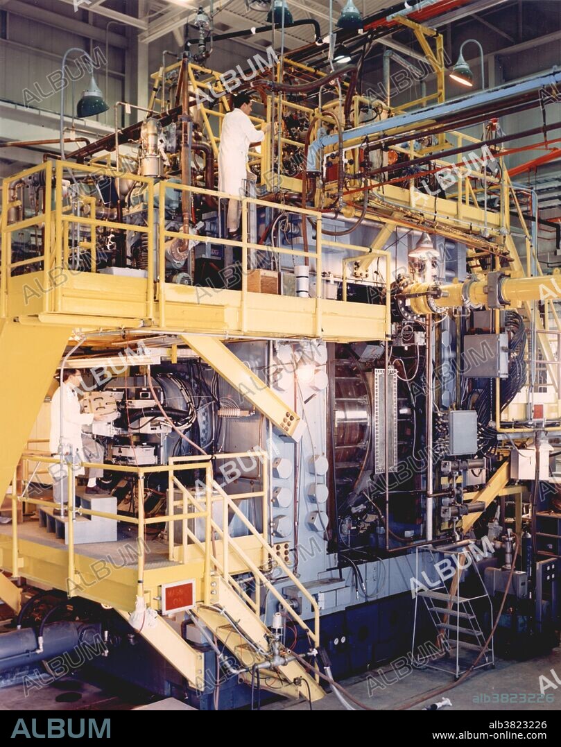 Historic image of the 80-inch bubble chamber at Brookhaven National Laboratory. In 1963, it was the largest particle detector of its type in existence. In 1964, the omega-minus particle, previously only theorized but never observed, was detected. The bubble chamber was decommissioned in 1974.