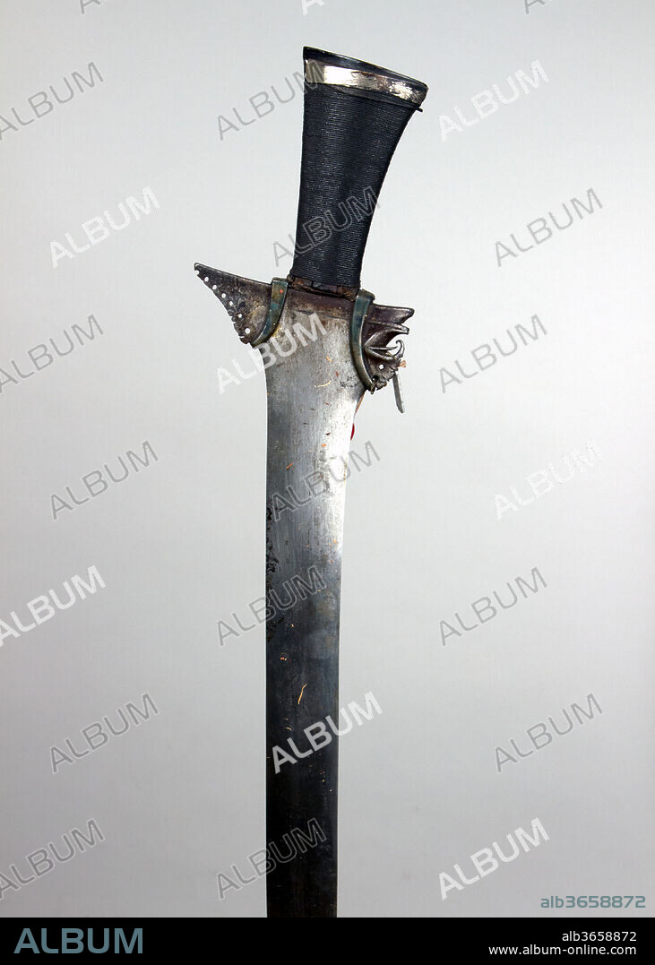 Kris. Culture: Philippine, Moro. Dimensions: L. 26 3/4 in. (67.9 cm); L. of blade 22 1/2 in. (57.2 cm); W. 4 1/4 in. (10.8 cm); Wt. 1 lb. 8.5 oz. (694.6 g). Date: 18th-19th century.