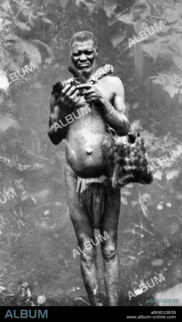 Bamileke (Bamileke) witch doctor or sorcerer, near Bangangte, a town and commune in Cameroon, West Africa. c1930.