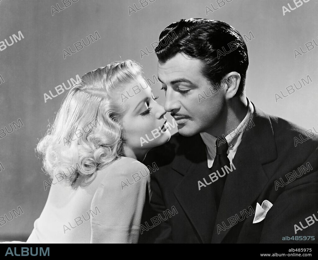 LANA TURNER and ROBERT TAYLOR in JOHNNY EAGER, 1942, directed by MERVYN LEROY. Copyright M.G.M.