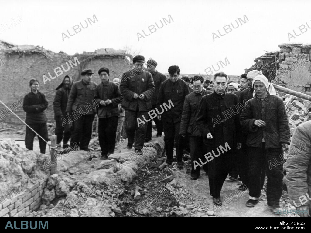 Chinese Premier Zhou Enlai visiting the site of destruction the day after a strong earthquake hit the vicinity of Xingtai in northern China's Hebei Province on March 8, 1966. (Photo by: Sovfoto/UIG via Getty Images).