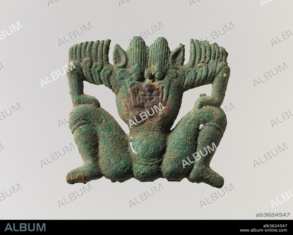 Plaque in the Form of a Demon. Culture: China. Dimensions: H. 3 11/16 in. (9.4 cm); W. 4 1/16 in. (10.3 cm).