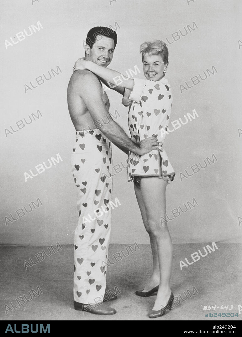DORIS DAY and JOHN RAITT in THE PAJAMA GAME, 1957, directed by GEORGE ABBOTT and STANLEY DONEN. Copyright WARNER BROTHERS.