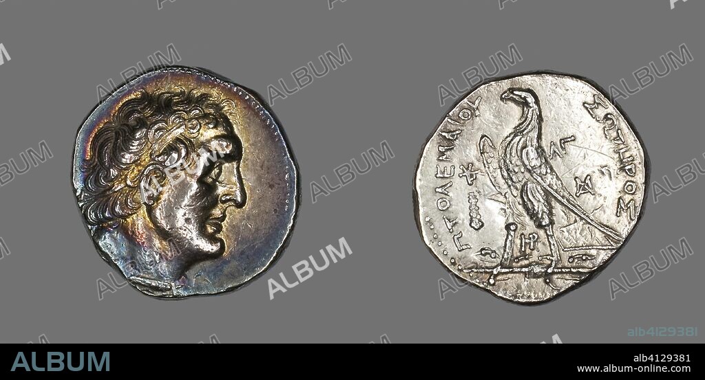 ANCIENT GREEK. Tetradrachm (Coin) Portraying King Ptolemy I. Greco-Egyptian. Date: 253 BC-252 BC. Dimensions: Diam. 2.7 cm; 14.14 g. Silver. Origin: Tyre.