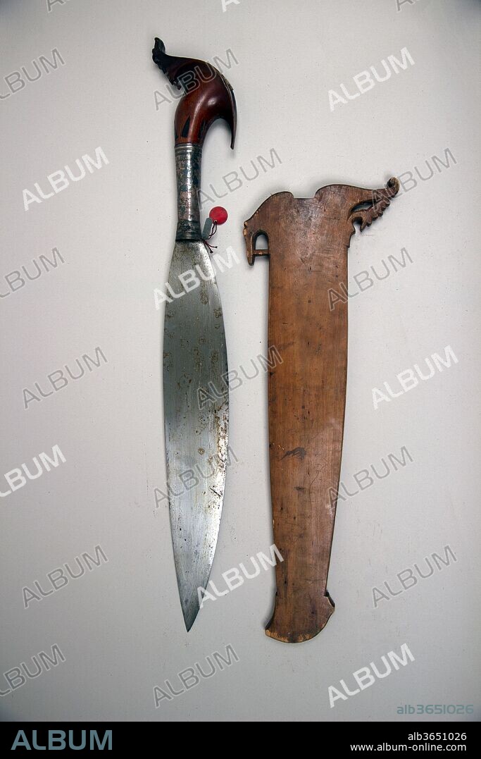 Knife (Barong) with Sheath. Culture: Philippine, Mindanao. Dimensions: L. with sheath 25 1/4 in. (64.1 cm); L. without sheath 23 3/4 in. (60.3 cm); L. of blade 15 3/4 in. (40 cm); W. 3 7/16 in. (8.7 cm); Wt. 1 lb. 13.4 oz. (833.5 g); Wt. of sheath 7.1 oz. (201.3 g). Date: 18th-19th century.