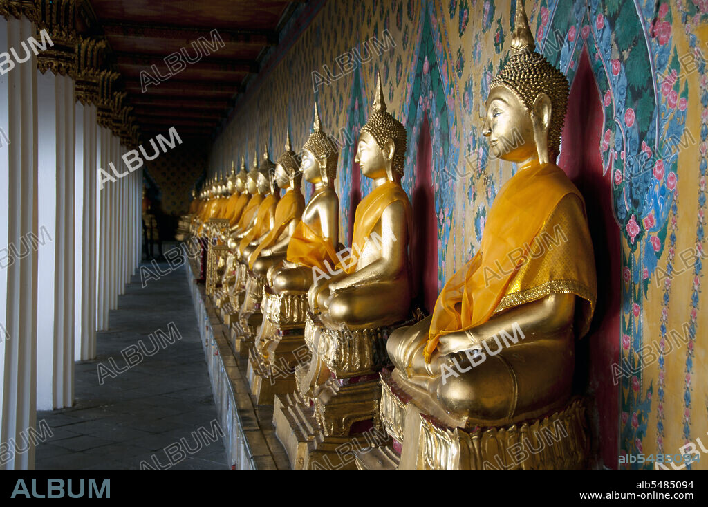 Thailand A row of Buddhas in the main temple complex Wat Arun