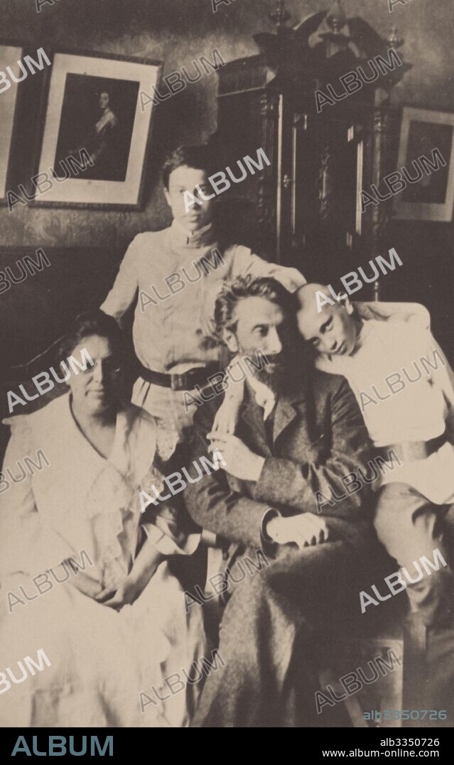 ANONYMOUS. Rosalia, Leonid, Boris and Alexander Pasternak in the dining room of their Moscow apartment.