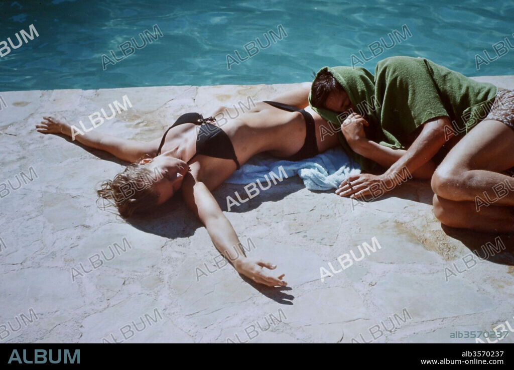 ALAIN DELON und ROMY SCHNEIDER in LA PISCINE, 1969, unter der Regie von JACQUES DERAY. Copyright S.N.C/TRITONE.