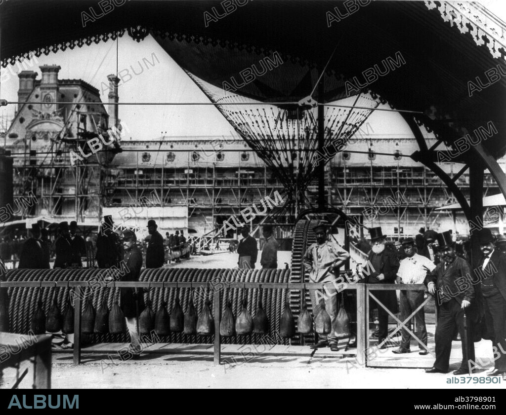 Machinery for hauling the giant captive balloon constructed by Henri Giffard, 1878. Henri Giffard (February 8, 1825 - April 14, 1882) was a French engineer. He invented the injector and the Giffard dirigible, an airship powered with a steam engine, and weighing over 400 pounds. It was the world's first passenger airship (then known as a dirigible). Both practical and steerable, the hydrogen-filled airship was equipped with a 3 hp steam engine that drove a propeller. The exhaust steam was mixed in with the combustion gases and it was hoped by these means to stop sparks rising up to the gas bag. He also installed a vertical rudder. On September 24, 1852 he made the first powered and controlled flight traveling over 16 miles from Paris to Trappes. He was able to make turns and circles, proving that a powered airship could be steered and controlled, but it was too slow to be effective. He was granted a patent for the injector in 1858. In 1878, he built a captive spherical balloon with a capacity of 25 liters, and a gondola accommodating 40 passengers. It was used to take aloft visitors at the International Exhibition in Paris. In response to his declining eyesight, he committed suicide in 1882, at the age of 57, leaving his estate to the nation for humanitarian and scientific purposes. His is one of the 72 names of scientists inscribed on the Eiffel Tower.