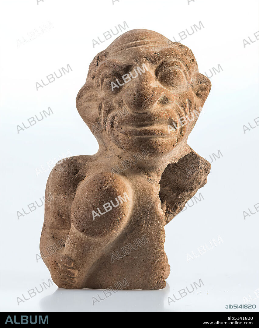Grotesque Man, clay, pressed into shape, hand modeled, fired (ceramic), clay, Total: Height: 10.2 cm; Width: 6.8 cm; Depth: 7.6 cm, ceramic, slavery; Slaves, penis, phallus, types of people, Hellenism, Early Imperial Period, Middle Imperial Period, The fragment of a Fayum terracotta with eyelet attached at the back shows the head and parts of the upper body of a man. It shows the typical tortured face of slaves or underclass; prominent features are the broad hooked nose, deep forehead and cheek wrinkles, thick lips and covered brow arches. The eyes are sharply contoured. A hair-wreath is indicated. A large phallus is clamped under the right arm. Lower body and the left side of the upper body are not preserved. The figure belongs to the group of the so-called Fayum terracottas. In Alexandria, the international, Greek-influenced center of Egypt, lives a multicultural society of Egyptians, Orientals, Greeks, Romans, Jews and others, whose different religious ideas are gradually blending together. Insights into this world of faith are provided by the so-called Fayum terracottas. They are part of the religious household, children's toys, knick-knacks, but also cult symbols, grave goods, pilgrimage images, votive offerings and magical objects for banishing evil forces. They can be found in houses, graves and sanctuaries.