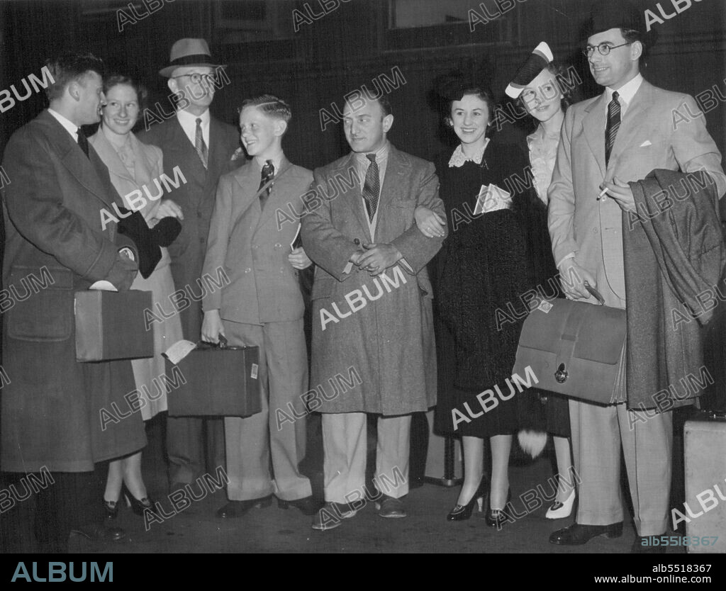 Relatives Arrive For Menuhin Wedding -- Members of the Nicholas family of Australia arrived in Oakland July 15, 1938, from the East to attend the wedding of Lindsay Nicholas to Hephzibah Henuhin, pianist and sister of Yehudi Menuhin, the violinist, at Los Gatos, Calif., July 16, 1938. Left to Right: Yehudi Menuhin and his wife, the former Nola Nicholas; George Nicholas of Melbourne, her father and father of the prospective bridegroom; his son, Hilton; Moshe Menuhin, Yehudi's father; Mrs. Nicholas, and Dr. and Mrs. Edmond Alcock of London. She is Linday's sister. July 15, 1938. (Photo by Associated Press Photo).