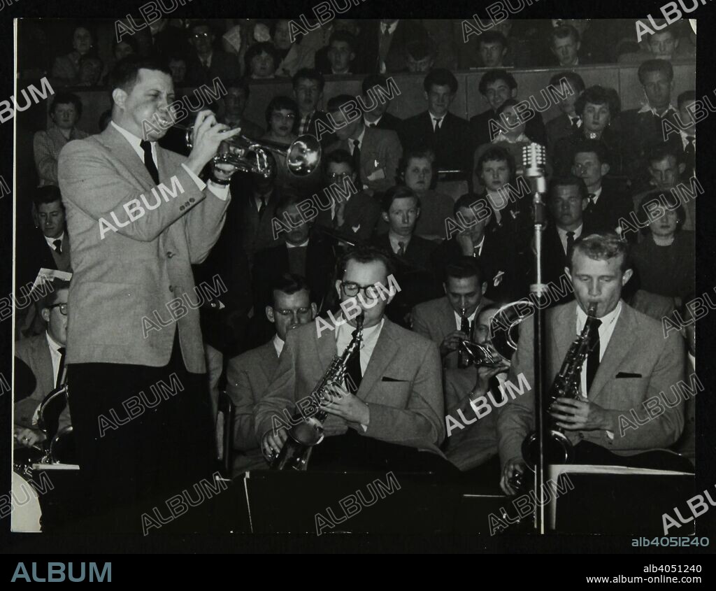 The Stan Kenton Orchestra in concert, 1956. Vinnie Tano (trumpet), Lennie Niehaus (alto saxophone) and Bill Perkins (tenor saxophone).