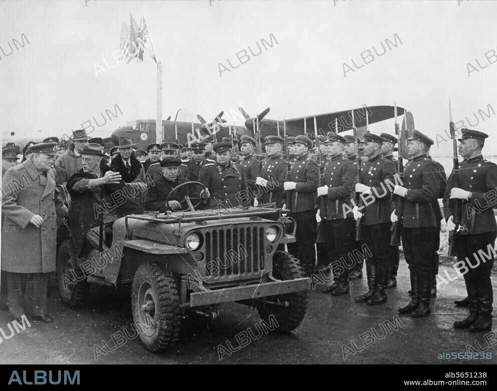 World War II / Yalta Conference /. 4-11 February 1945. Meeting of the heads of government of the United States, the United Kingdom, and the Soviet Union to discuss the postwar reorganization of Germany and Europe. President Roosevelt (in jeep), talking to Winston Churchill at Yalta airfield. Photo, February 1945.