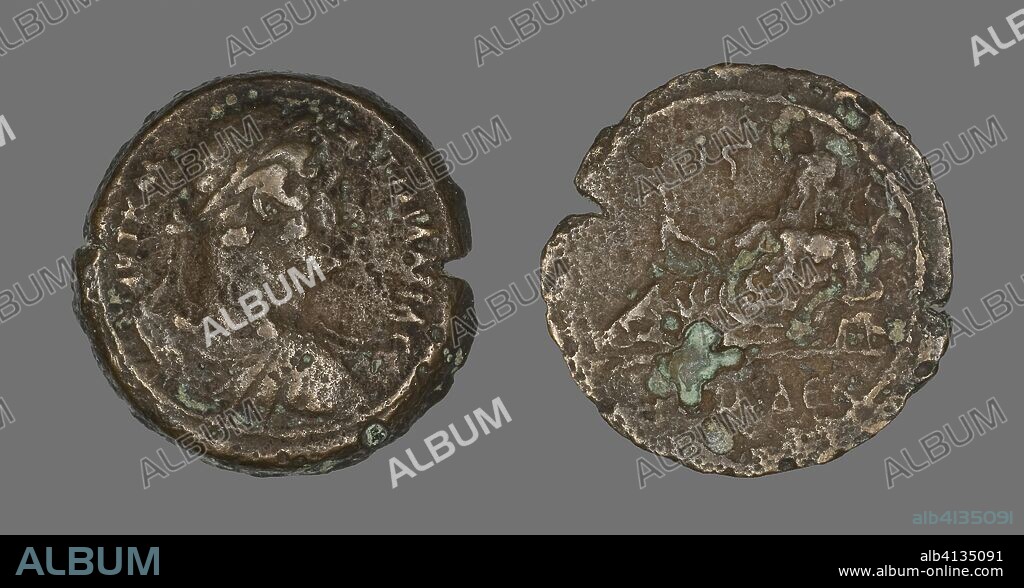 ANCIENT ROMAN. Coin Portraying Emperor Hadrian. Roman. Date: 117 AD-138 AD. Dimensions: Diam. 3.4 cm; 18.22 g. Bronze. Origin: Roman Empire.