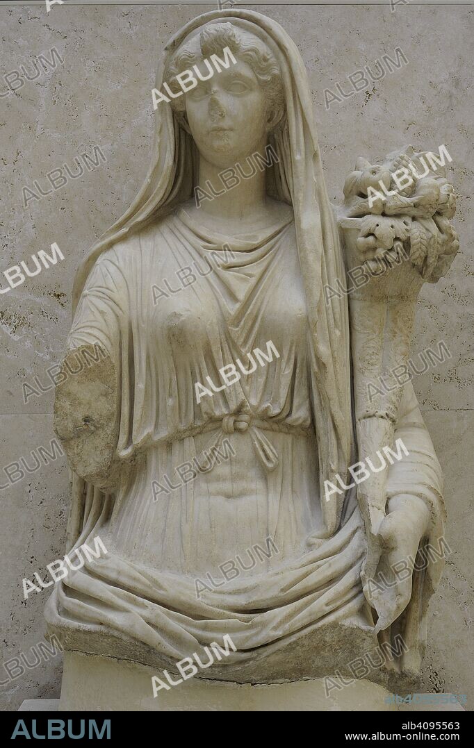 Livia Drusila (59/58 a. C. -29). Emperatriz romana consorte. Esposa de Augusto. Escultura sedente de Livia divinizada como Abundancia. Dinastía Julio-Claudia. Años 15-20. Mármol. Procedente de Iponuba (Baena, provincia de Córdoba, Andalucía). Museo Arqueológico Nacional. Madrid. España.